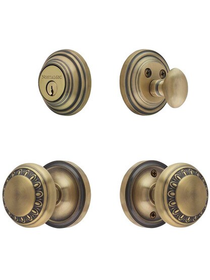 Classic Rosette Entry Set, Keyed Alike with Ovolo Knobs in Antique Brass.
